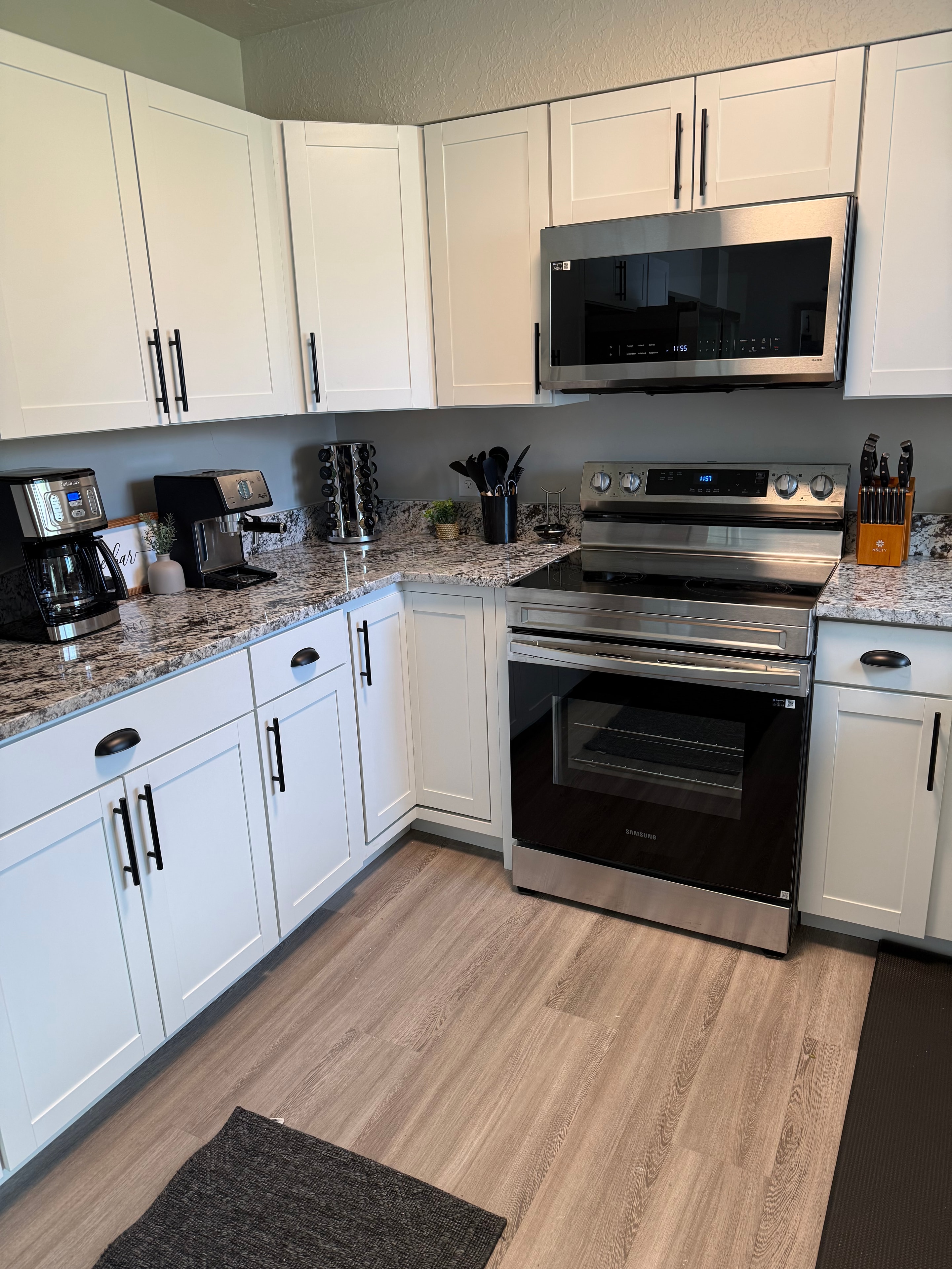 Kitchen with stainless range and granite countertops