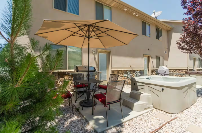 Private back patio with hot tub, BBQ and outdoor seating