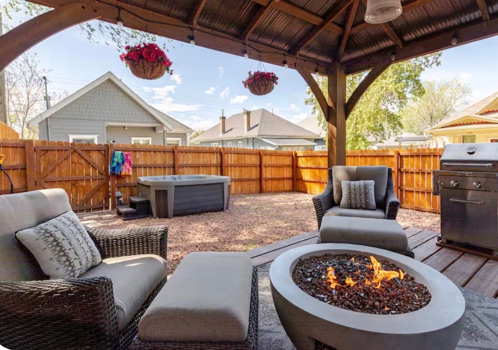 Private backyard hot tub in fenced yard